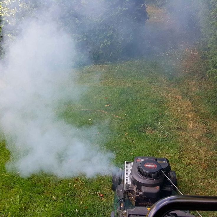 causes of lawnmower smoking