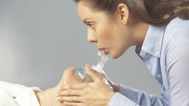 using a pocket mask where should the rescuer be positioned