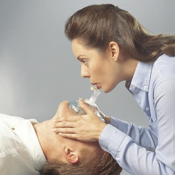 using a pocket mask where should the rescuer be positioned