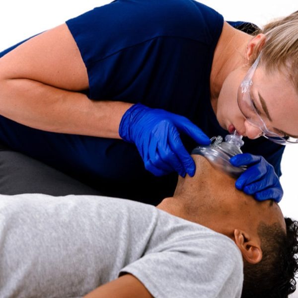 using a pocket mask where should the rescuer be positioned